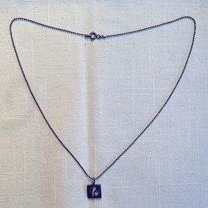 Silver/gun metal chain with fun charm